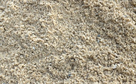 superficie marrón de la playa de arena, arena en la playa textura natural para background.beautiful concepto de spa abstracto bandera de mar paraíso isla de los días de verano, vista superior