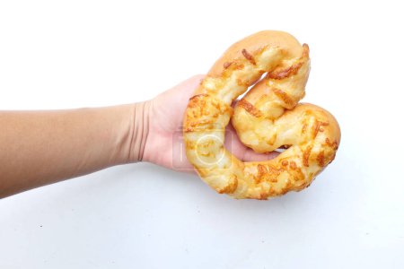 Bacon and Mayonnaise Topped on Heart Shaped Bread  in a  hand woman asian  Isolated on a White Backdrop