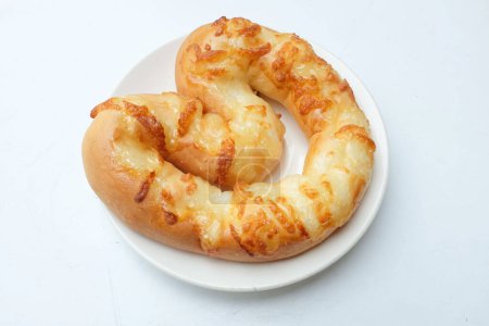 Bacon and Mayonnaise Topped on Heart Shaped Bread  in a white  plateIsolated on a White Backdrop