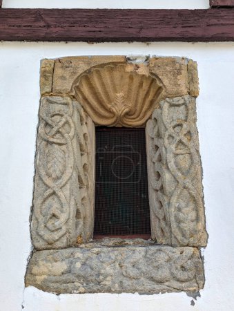 Window in the chapel of San Bartolome de Nava cemetery showing Viking type ornamentation, Nava, Asturias, Spain