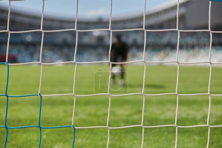 Photo for Football, soccer goal net with green grass background - Royalty Free Image