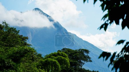 Partial view of the cloud-shrouded Marumbi Peak, an important mountain in the Serra do Mar region of the state of Paran, Brazil