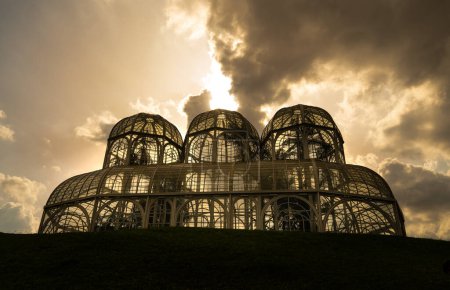 Greenhouse of plants from the Atlantic forest at the Curitiba Botanical Garden at dusk.