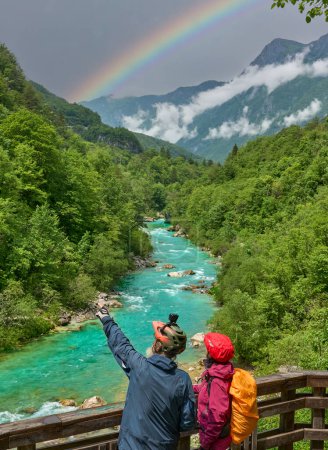 Photo for Active senior couple  on a e-bike tour in the Valley of River Soca, Triglav National Park near Kobarid, Slovenia - Royalty Free Image