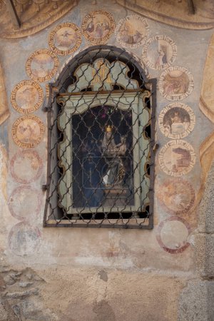 Photo for VILLANDRO, ITALY - SEPTEMBER 04, 2020: the recently restored historical paintings on the external walls long the way of the center of the little mountain town - Royalty Free Image