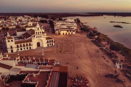 Photo for Aerial view of the town of El Rocio and the Sanctuary of Our Lady of Rocio in the blue hour - Royalty Free Image