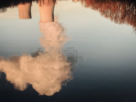 Photo for Seascape with reflection of the cooling towers of the nuclear power plant in the French municipalities of Cruas and Meysse - Royalty Free Image