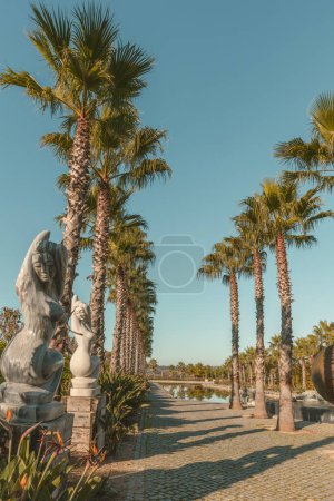 Photo for Landscape in Oriental Garden Bacalhoa Buddha Eden Park with Stone sculptures in Portugal - Royalty Free Image