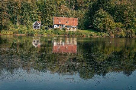 House by the lake in Teutoburg Forest natural landscape in North Rhine-Westphalia Germany, Nature Travel Germany 