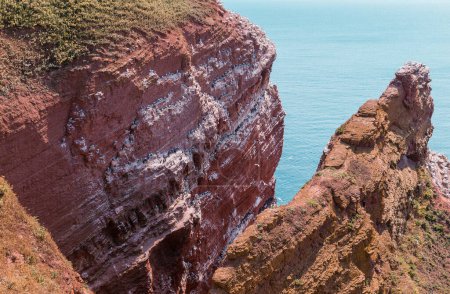 Red cliffs and rock formation on the island of Heligoland. Heligoland is a nature reserve, is located in the middle of the North Sea and belongs to Germany.