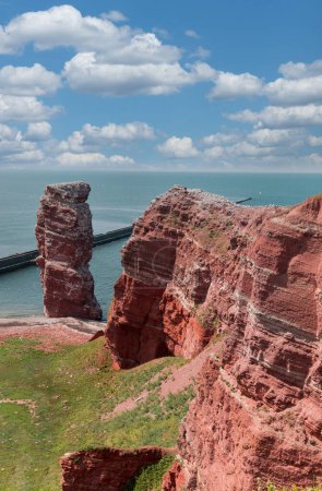 Long Anna, a famous red rock on the island Heligoland. North sea, Germany.
