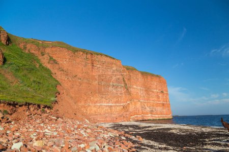 Red cliffs and rock formation on the north beach of the island of Heligoland. North sea. Germany.