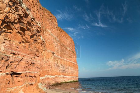 Red cliffs and rock formation on the north beach of the island of Heligoland. North Sea. Germany.