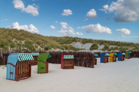 Beach chairs on the beach of island Heligoland. North sea. Germany.