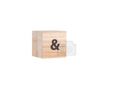wooden cubes with the inscription & on a white isolated background close-up