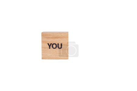 wooden cubes with the inscription You on a white isolated background close-up