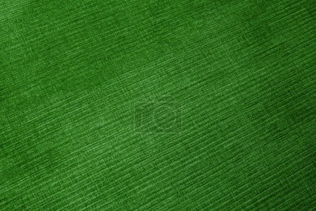 Textured corduroy furniture fabric in green colors close-up