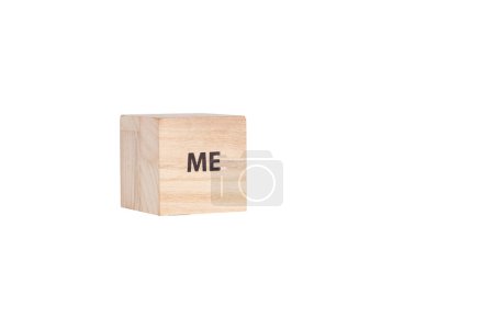 wooden cubes with the inscription Me on a white isolated background close-up