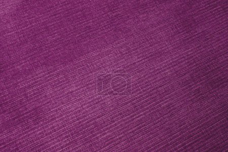 Textured corduroy furniture fabric in purple colors close-up