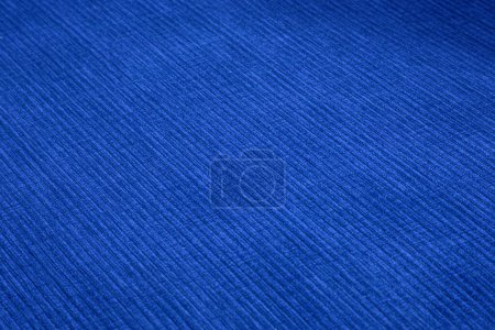 Tejido de muebles de pana texturizada en colores azules de cerca