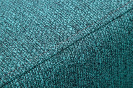 Texturé tissu de meubles bleu avec coutures gros plan