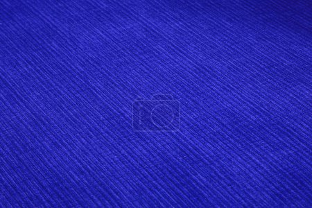 Tejido de muebles de pana texturizada en colores azules de cerca