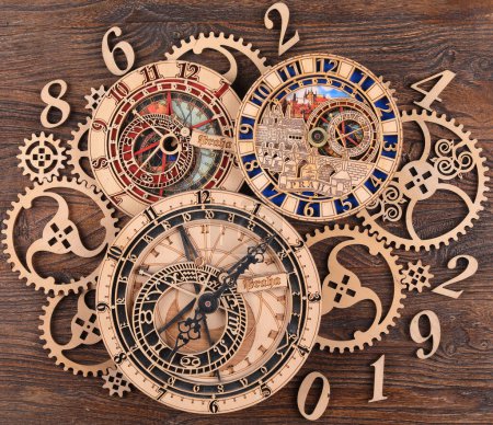 Photo for Wooden infinity clock on wooden background - Royalty Free Image