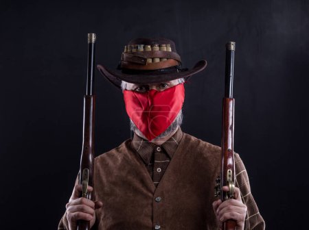 Photo for Wild West, cowboy with weapons - Royalty Free Image