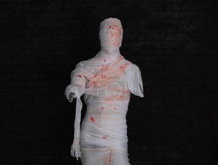 Photo for Bloody mummy on a black background - Royalty Free Image