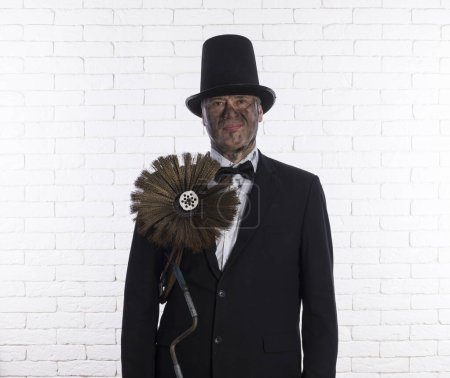 Photo for Portrait chimney sweep, brush for cleaning chimneys - Royalty Free Image