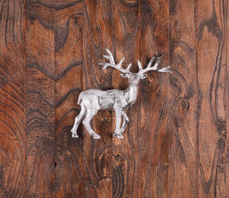 Christmas tree reindeer on wooden background