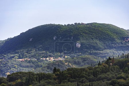 Photo for Mountain village in the north of the island of Corfu between wooded mountains and olive plantations - Royalty Free Image