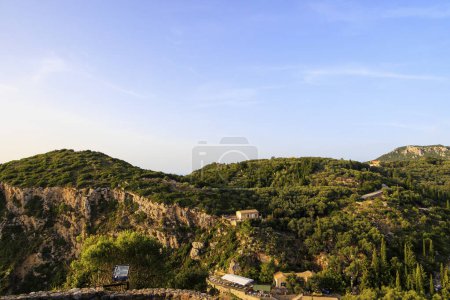 Photo for View in the evening under a blue sky over the hills and the forest near Paleokastrtitsa on the island of Corfu - Royalty Free Image