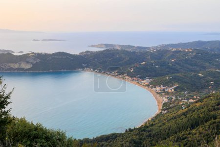 Photo for Sunset over the sea and the bay of Agios Georgios on the island of Corfu - Royalty Free Image