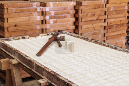 Photo for Cut olive oil soap bars ready to be stamped with the soap stamp in a soap factory, Greece, Corfu, 25.10.2023 - Royalty Free Image