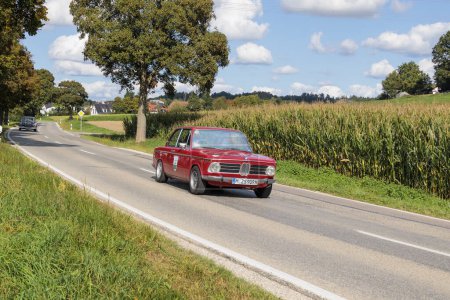 Photo for Alpina BMW 1600 classic car on the road near Blumenthal as a participant of the Fuggerstadt Classics, Augsburg September 24, 2023, Augsburg, Germany - Royalty Free Image
