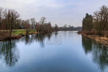 the renaturalised course of the Wertach river on a cloudy day in the Goggingen district of Augsburg