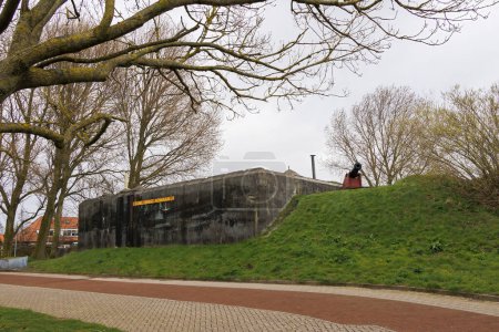 Photo for Fortifications and bunkers from the Napoleonic era in the Dutch fort known as Dirks Admiraal in Den Helder on a cloudy, rainy spring day - Royalty Free Image