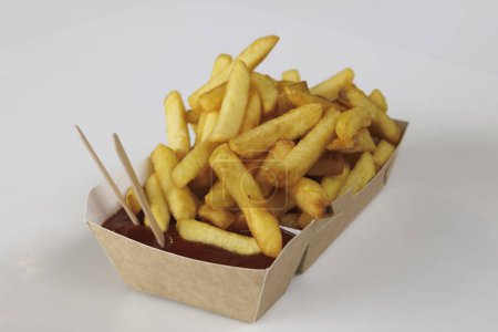 french fries  to go in a fast food restaurant in the Dutch town of Den Oever in the Netherlands