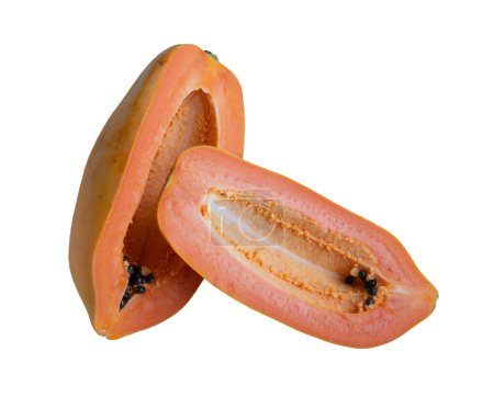 Ripe papaya cut in half on isolated white background. Carica papaya