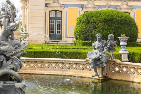 Photo for Queluz, Lisbon, Portugal- November 21, 2022: Beautiful and vintage sculptures of the fountain of the garden of Queluz Palace - Royalty Free Image