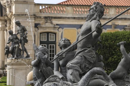 Photo for Queluz, Lisbon, Portugal- November 21, 2022: Beautiful and vintage sculptures of the fountain of the garden of Queluz Palace - Royalty Free Image
