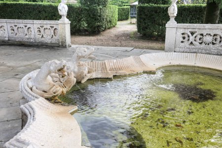 Photo for Queluz, Lisbon, Portugal- November 21, 2022: Beautiful fountain with sculptures in the garden of The National Palace of Queluz - Royalty Free Image