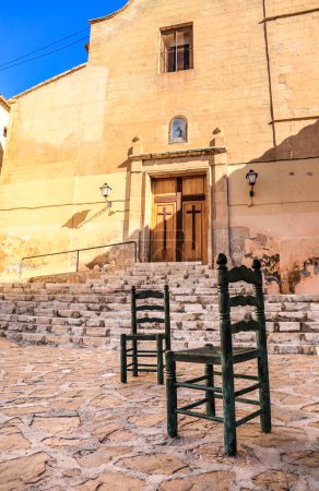 Photo for Finestrat, Alicante, Spain- February 5, 2023: Sant Bartomeu church square in the town of Finestrat in winter - Royalty Free Image