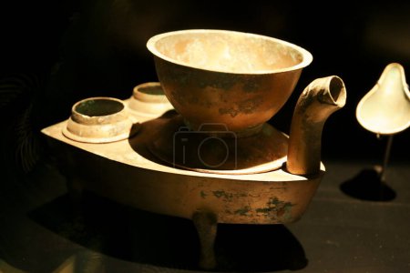 Photo for Alicante, Spain- April 14, 2023: Cooking stove at Terracota Army exhibition in the Archaeological Museum of Alicante - Royalty Free Image