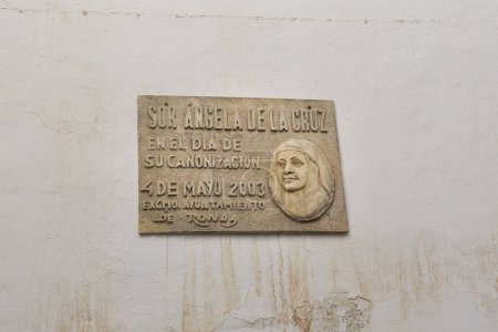 Photo for Ronda, Malaga, Spain- October 21, 2023: Commemorative plaque carved in stone to Sor Angela de la Cruz in Malaga town - Royalty Free Image