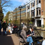 Salisbury, England- March 29, 2024: Cozy cafe bar terraces next to the Avon River in Salisbury city, England