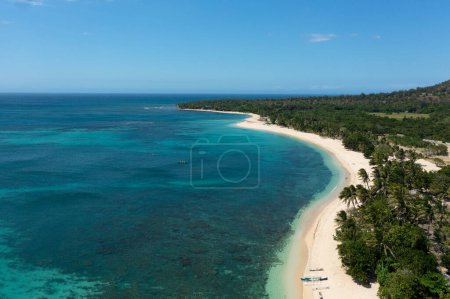 Foto de Seascape with tropical sandy beach and blue ocean. Pagudpud, Ilocos Norte Philippines - Imagen libre de derechos