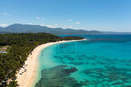 Foto de Tropical landscape with beautiful sandy beach and blue sea. Pagudpud, Ilocos Norte Philippines - Imagen libre de derechos