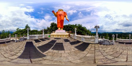 Photo for The worlds tallest walking Buddha statue - Ranawana Purana Rajamaha Viharaya, Kandy, Sri Lanka. 360 Degree view. - Royalty Free Image